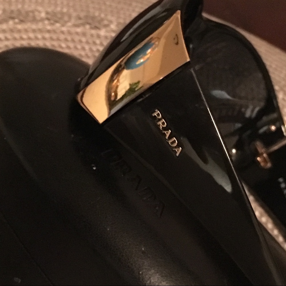 Prada women shades/sunglasses black and gold used